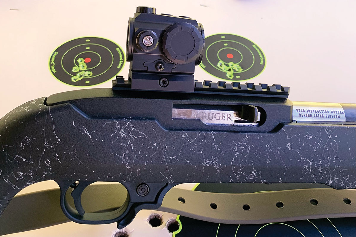 The Ruger carbon fiber 10-22 comes with a factory aluminum scope rail for convenient mounting of any sight.